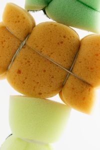 Kaboompics - Stacked Cleaning Sponges With String