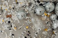 Kaboompics - Disco Ball and Champagne Bottle New Year's Eve Party Flat Lay