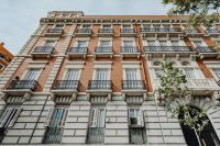 Kaboompics - Wide View of Brick-and-Stone Madrid Facade with Rows of Ornate Balconies