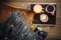 Kaboompics - Old camera, mug with tea and books