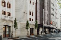 Kaboompics - Modern Glass Facade Between Historic Madrid Buildings on a Pedestrian Street