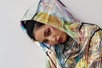 Kaboompics - Portrait of Asian Woman in Iridescent Holographic Fabric and Silver Sequins