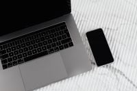 Kaboompics - Top View of Laptop and Smartphone with Copy Space on White Marble