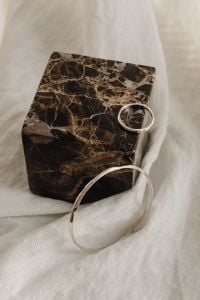 Kaboompics - Minimal Silver Ring and Bangle with Marble and Linen
