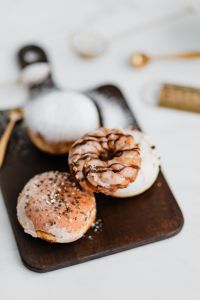 Kaboompics - Homemade Raspberry Polish Paczki Donut with Powdered Sugar