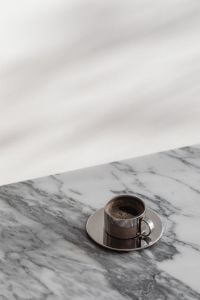 Kaboompics - Chrome Coffee Cup on Arabescato Marble