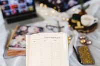 Kaboompics - Open 2018 Planner With Laptop And Coffee In Bed