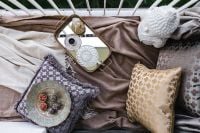 Kaboompics - Top View of an Ornate Tea Tray on Layered Balcony Cushions