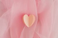 Kaboompics - Folded Paper Heart on Pink Tulle with Minimal Valentine Copy Space