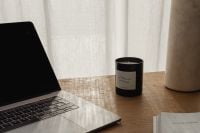Kaboompics - Laptop Keyboard, Scented Candle and Open Magazine