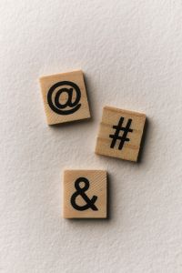 Kaboompics - Wooden Symbol Tiles with @ # and &