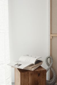 Kaboompics - Open Book with Circular Diagrams beside Textured Sculptural Ornament