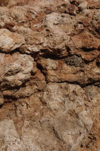 Kaboompics - Layered Ochre Limestone Surface Texture