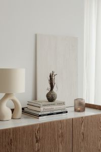 Kaboompics - Close-Up of a Ceramic Table Lamp beside a Textured Glass Candle Holder
