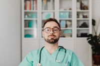 Kaboompics - Doctor Seated in Office With Stethoscope