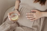 Kaboompics - Pregnant Woman Holding Lemon Water While Resting