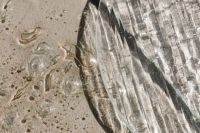 Kaboompics - Bubbled Glass Texture beside a Curved Ribbed Pane