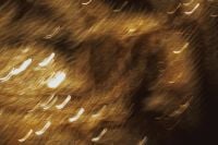 Kaboompics - Diagonal Gold Light Streaks over Black, High-Contrast Abstract Texture for Backgrounds