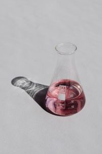 Kaboompics - Minimal Laboratory Flask With Pink Chemical Solution