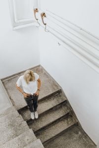 Kaboompics - Modern Staircase Handrail and Concrete Steps, Minimal Architectural Background with Partial Figure