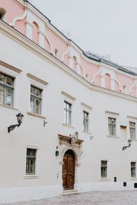 Kaboompics - Pink Trim and Ornate Door on Krakow Historic Building