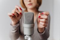 Kaboompics - Woman Making Finger-Snap Sounds around a Studio Microphone, ASMR Recording