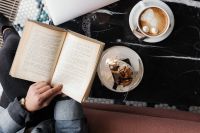 Kaboompics - Coffee Break in a Cafe with a Book and Dessert