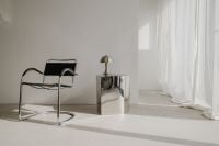 Kaboompics - Bright Interior with Chrome Chair, Table Lamp and Sheer Curtains