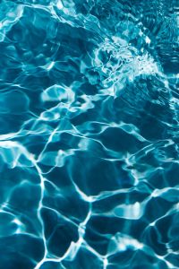Kaboompics - Wavy water surface in a swimming pool