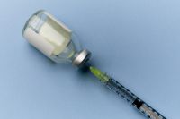 Kaboompics - Medical Vial with Green Needle Syringe
