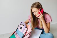 Kaboompics - Close Up of Phone and Homework Notebook