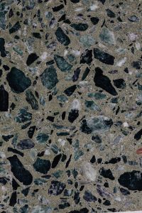 Kaboompics - Dark Brown Terrazzo Surface with Black, Cream and Deep Green Aggregate