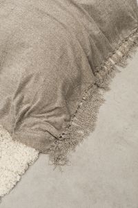 Kaboompics - Close-Up Beige Fringed Throw on a Bed