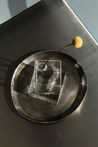 Kaboompics - Glass Cube and Yellow Flower Top View