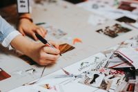 Kaboompics - Designer Writing Ideas on Creative Planning Board with Image Cutouts