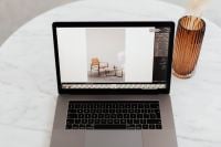 Kaboompics - MacBook Pro 15 laptop and iPhone 11 Pro on a marble table