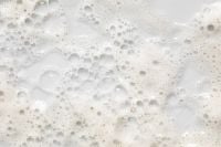Kaboompics - Wide White Foamy Cleanser Background with Bubble Clusters and Fine Lather