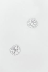 Kaboompics - Abstract White Foam Bubble Network with Scattered Open Space, Vertical Background