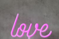Kaboompics - Pink Neon Love Sign on Gray Concrete Wall