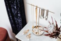 Kaboompics - Silver Watches and Gold Chains on a Jewelry Stand beside Dried Flowers, Marble Vanity