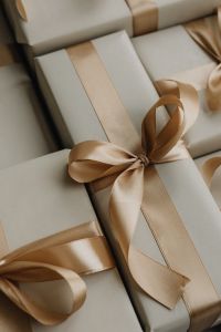 Kaboompics - Elegant Gift Boxes with Wide Satin Ribbons
