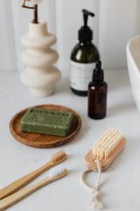 Natural Bathroom Skincare and Hand Care with Olive Soap, Wooden Brushes and Amber Bottles