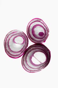 Kaboompics - Red Onion Slices on White Background