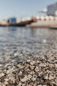 Kaboompics - Blurred Seawater and Pebble Beach with Coastal Copy Space