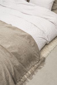 Kaboompics - Close-Up Beige Throw with Fringe