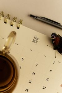Kaboompics - May 2027 Calendar With Butterfly Tea and Pen