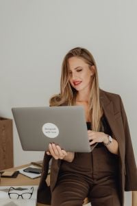 Kaboompics - Woman Working on Laptop While Seated at Desk