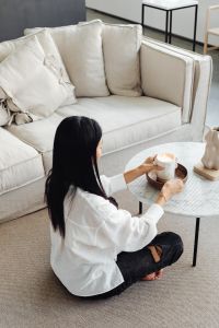 Kaboompics - Candle Lighting Ritual in a Calm Living Room