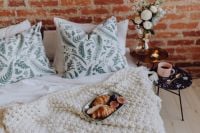 Kaboompics - Croissants and Fresh Figs on a Cozy Bed, with Coffee and Flowers at the Bedside