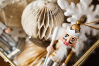 Kaboompics - Nutcracker and Paper Ornament Christmas Flat Lay
